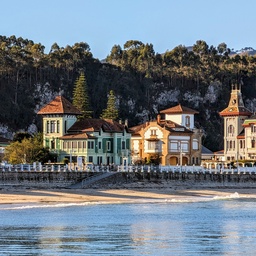 A coastal town with colorful ornamented buildings