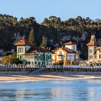 A coastal town with colorful ornamented buildings