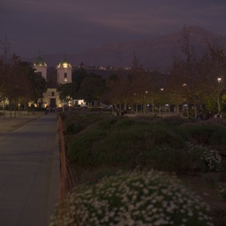 A dark, quiet park at twilight.