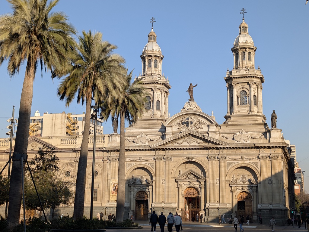 A large, ornate cathedral in a city square.
